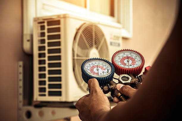 Professional Air Conditioning Service technician working in Strasburg, PA